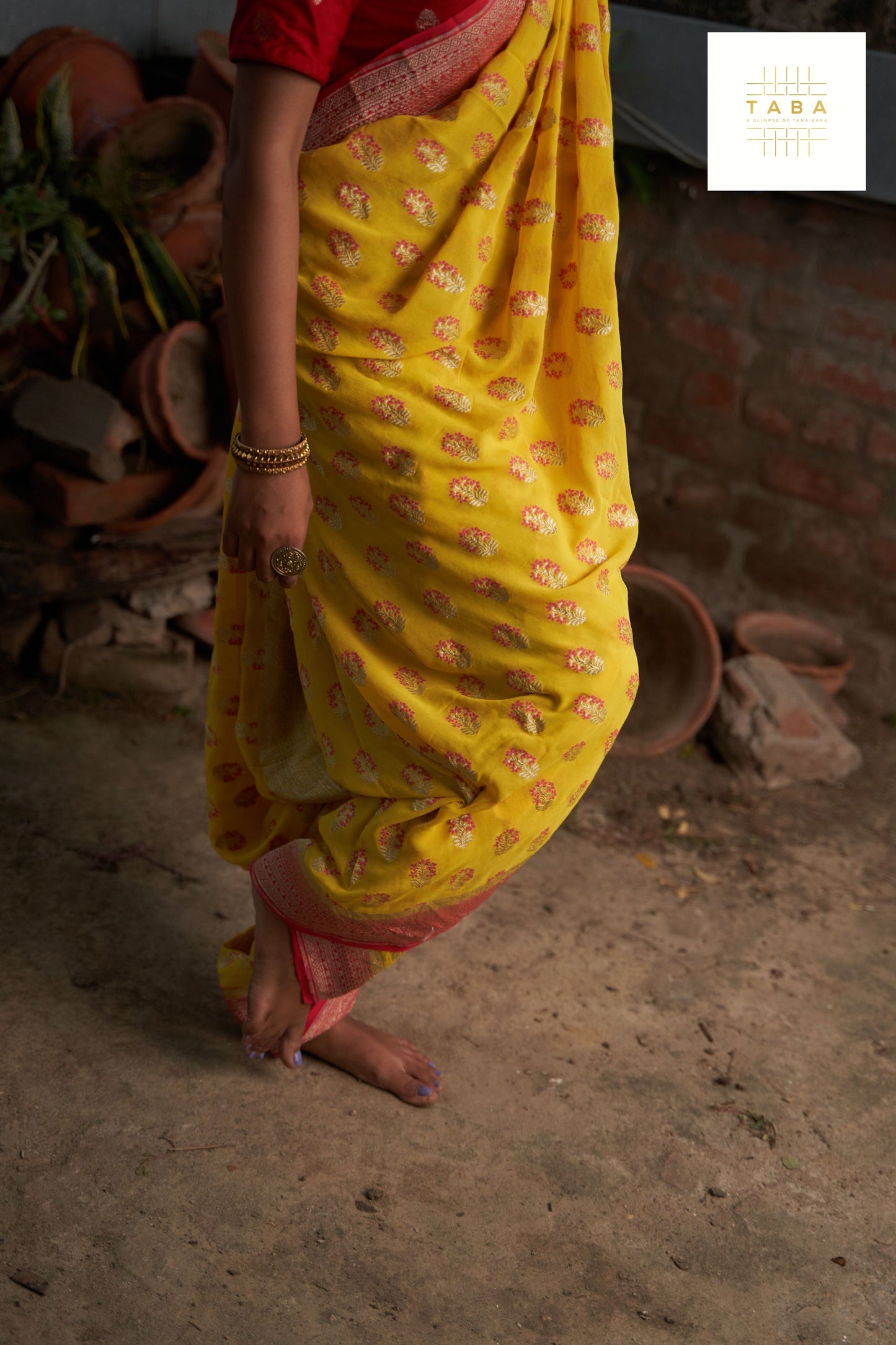 Bright Yellow Red Border Meenadar Buta Fekua Saree
